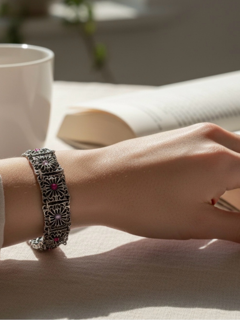 Vintage-Style Filigree Bracelet with Pink Accents